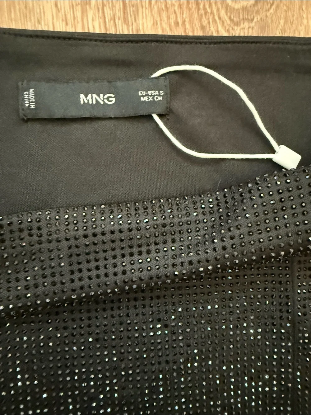 Black mini rhinestone skirt by Mango size S